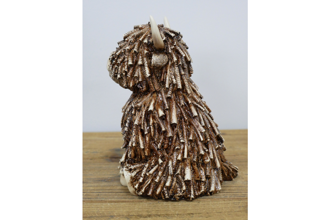 Medium Sitting Highland Cow