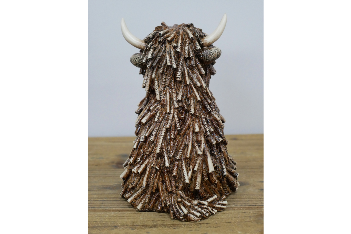 Medium Sitting Highland Cow