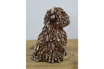 Medium Sitting Highland Cow