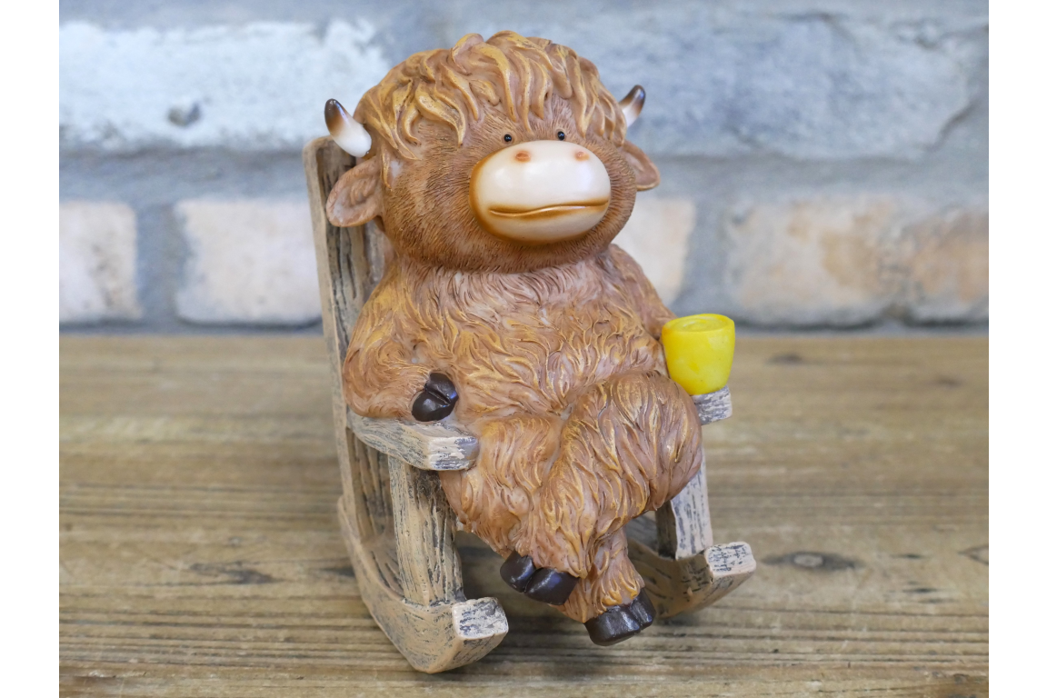 Highland Cow On Rocking Chair