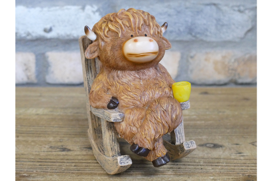 Highland Cow On Rocking Chair