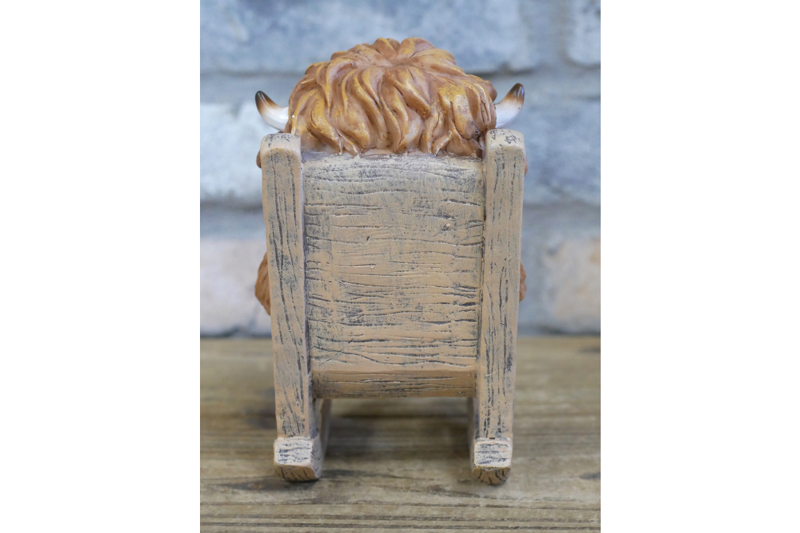 Highland Cow On Rocking Chair
