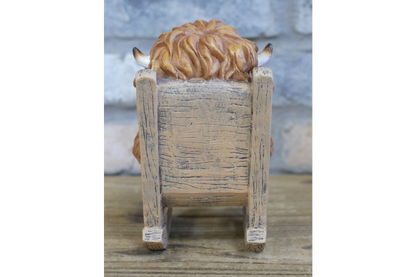 Highland Cow On Rocking Chair