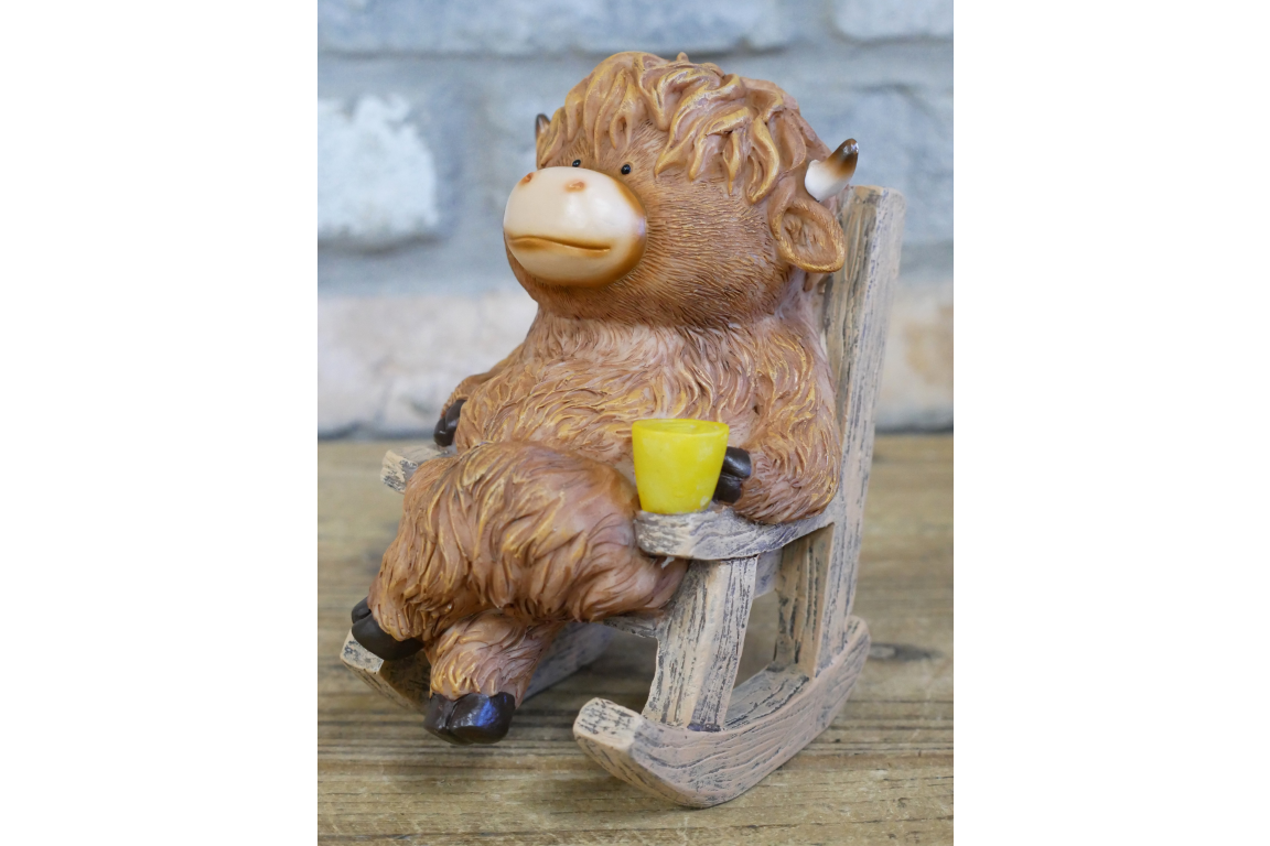 Highland Cow On Rocking Chair