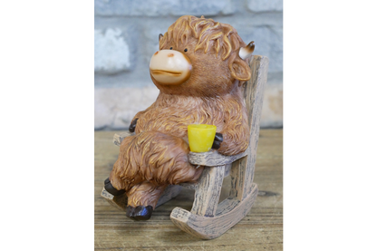 Highland Cow On Rocking Chair